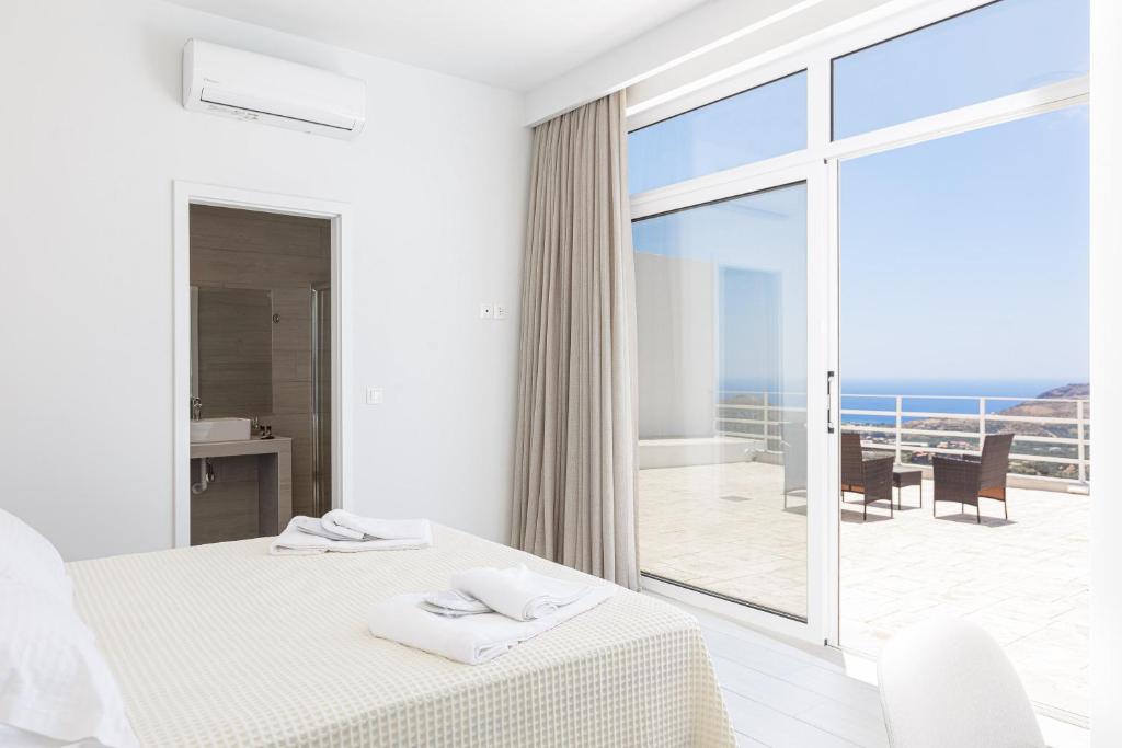 Posteľ alebo postele v izbe v ubytovaní Petres Villas