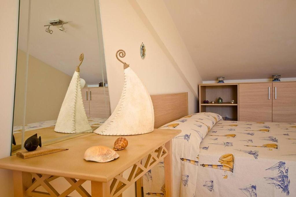 Posteľ alebo postele v izbe v ubytovaní Adriana casa vacanze mare Etna Sicilia