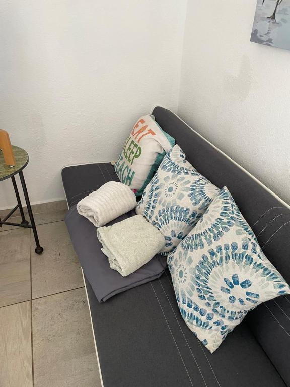Posezení v ubytování Las Palmas room with terrace and private bathroom