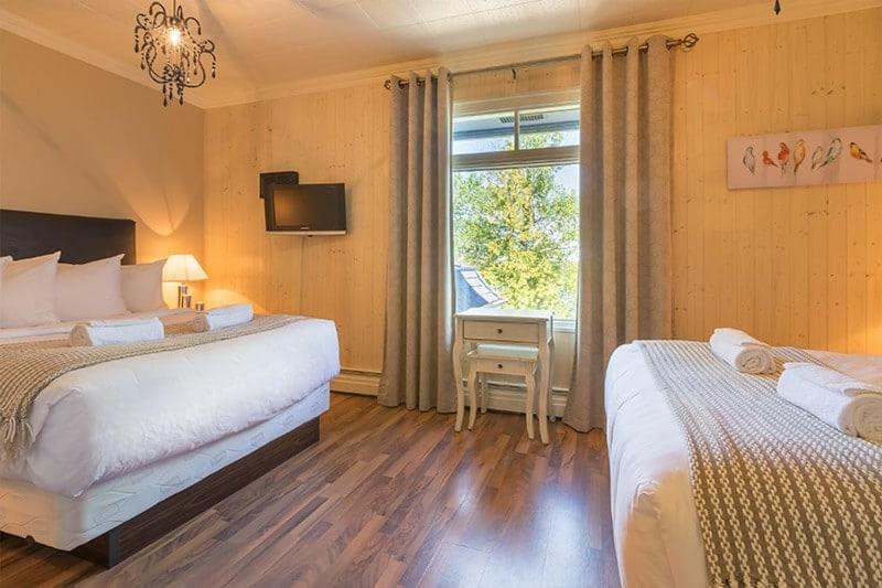 Una cama o camas en una habitación de Auberge des Berges