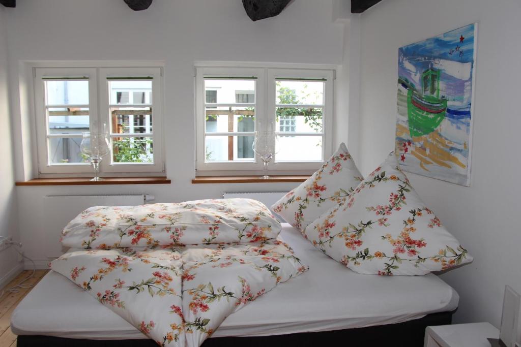 En eller flere senge i et værelse på Schmuckstück