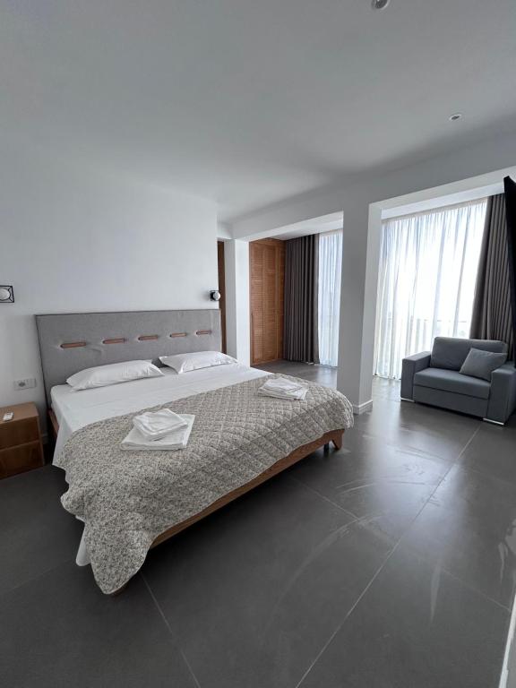 Postel nebo postele na pokoji v ubytování Escape Suites