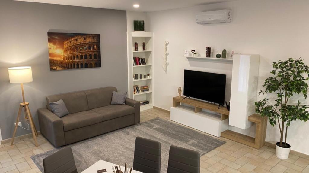 A seating area at Borgo San Lorenzo Roma