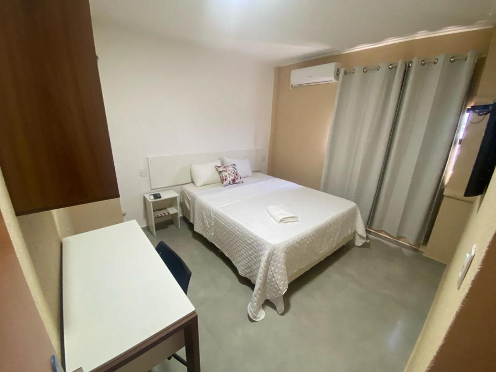 Postel nebo postele na pokoji v ubytování Hotel Sur Brasil
