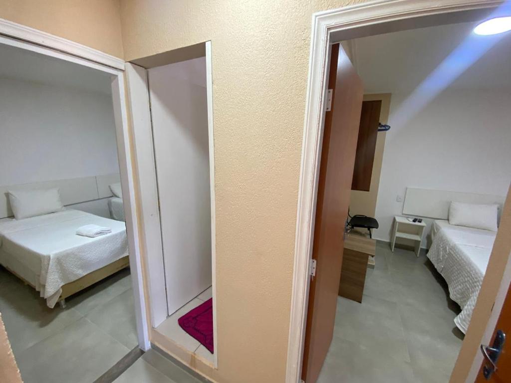 Postel nebo postele na pokoji v ubytování Hotel Sur Brasil