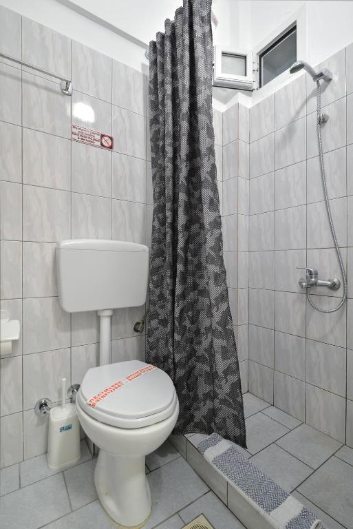 Koupelna v ubytování PERASMA ROOMS