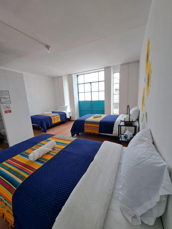 Postel nebo postele na pokoji v ubytování Casa CarpeDM
