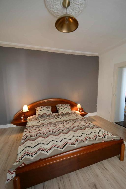 Postel nebo postele na pokoji v ubytování Appartement de caractère