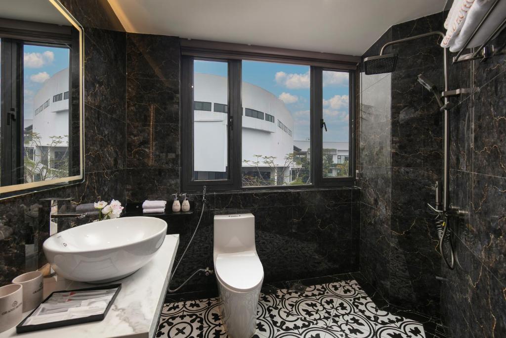 Koupelna v ubytování Grand Hanoi Hotel