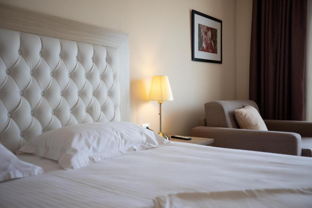 Postel nebo postele na pokoji v ubytování Hotel Bleart