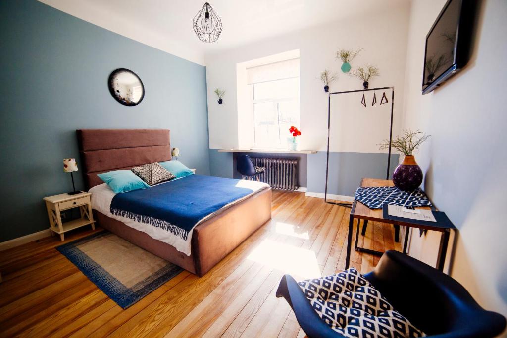 Ένα ή περισσότερα κρεβάτια σε δωμάτιο στο Baltic Design Apartments with free Parking and self check in