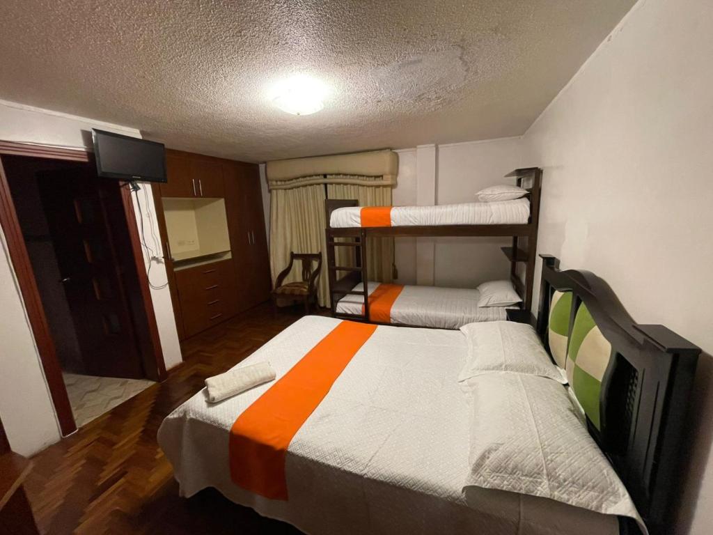 Postel nebo postele na pokoji v ubytování Hostel Tierra de Fuego