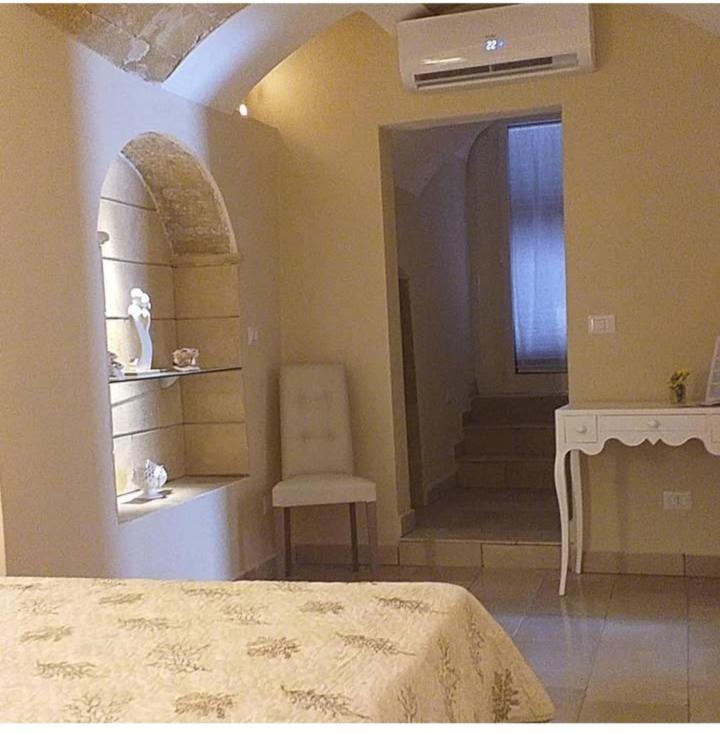 Łóżko lub łóżka w pokoju w obiekcie B&B Corte Cantalupi