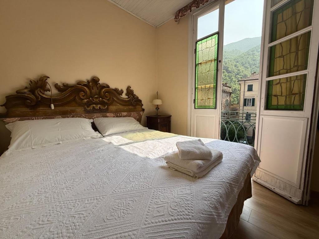Postel nebo postele na pokoji v ubytování Albergo Dellangelo