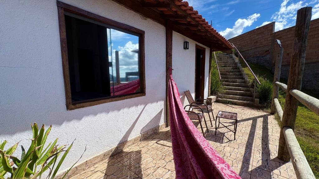 Ein Balkon oder eine Terrasse in der Unterkunft Loft Teto Muriquis