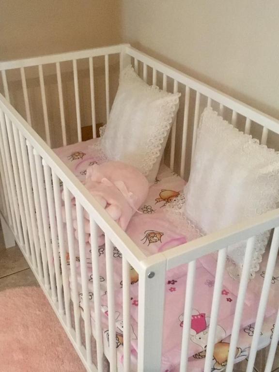 Posteľ alebo postele v izbe v ubytovaní Ádám Apartmanház