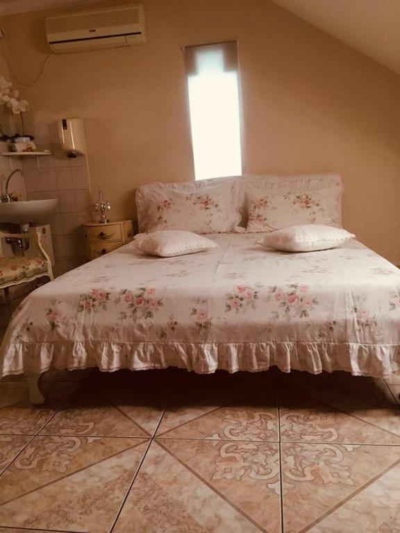 Posteľ alebo postele v izbe v ubytovaní Ádám Apartmanház