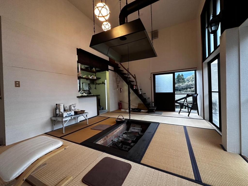 a room with a swimming pool in the middle of a room at Itoshima - House - Vacation STAY 19051 in Itoshima