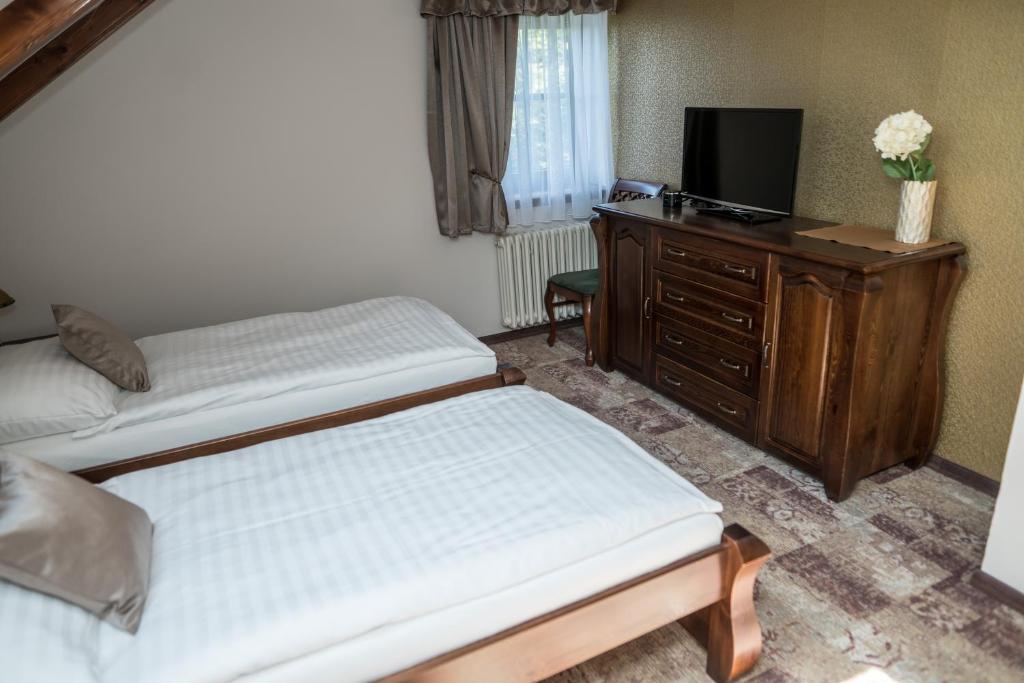 Postel nebo postele na pokoji v ubytování Villa Žerotín Penzion Bed & Breakfast