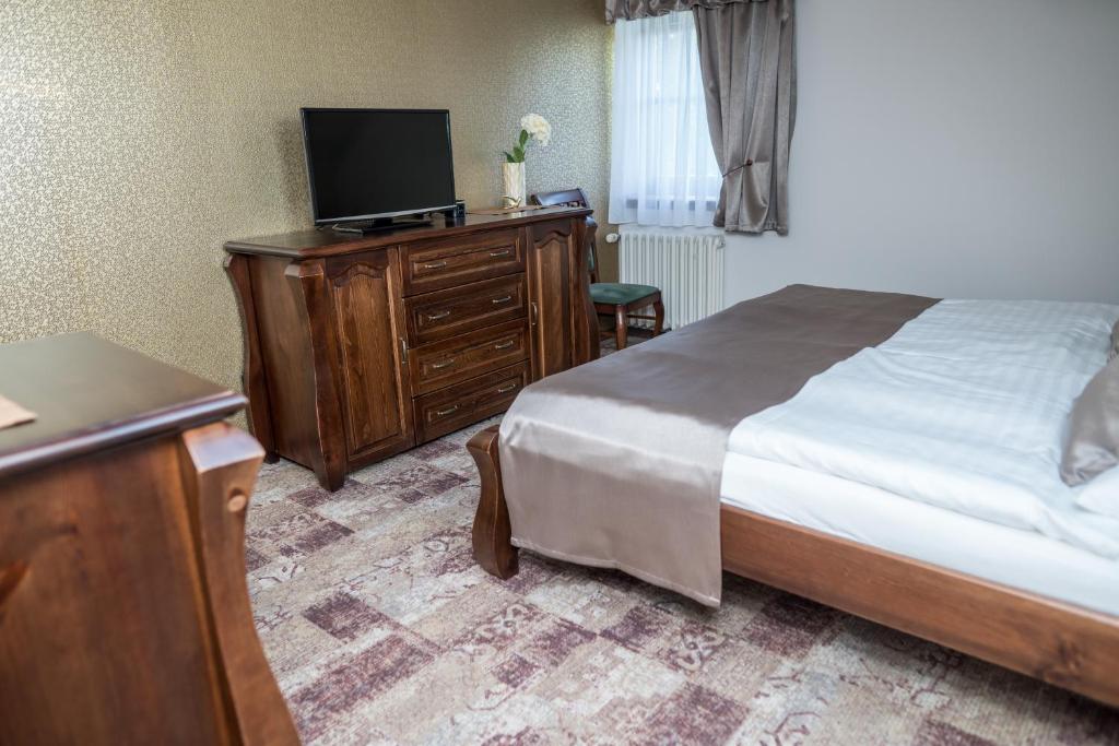 Postel nebo postele na pokoji v ubytování Villa Žerotín Penzion Bed & Breakfast