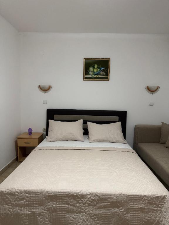 Postel nebo postele na pokoji v ubytování Studio Apartments Domenik