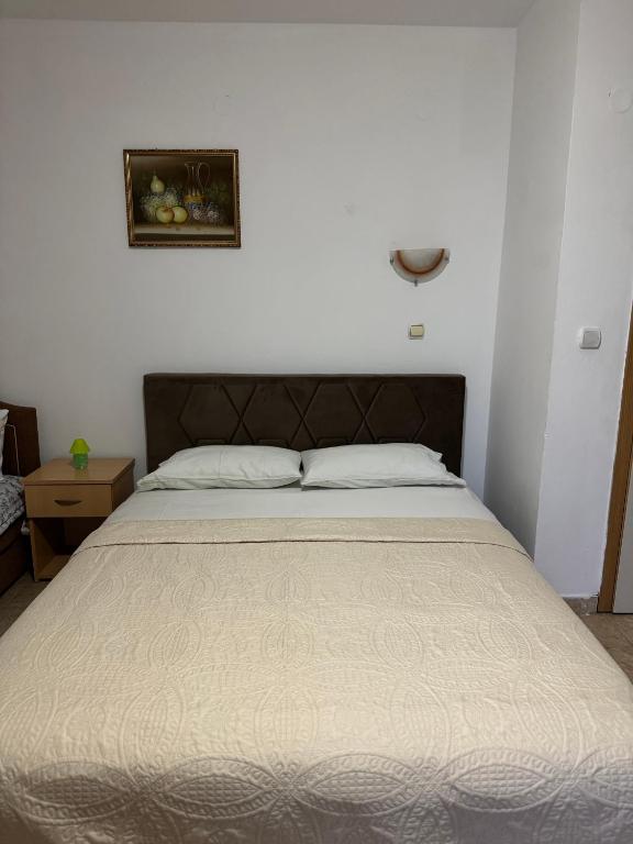 Postel nebo postele na pokoji v ubytování Studio Apartments Domenik