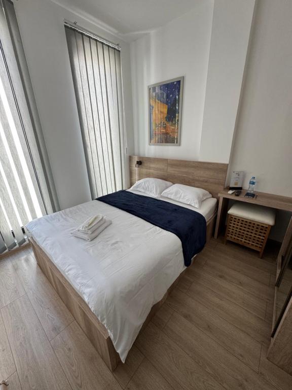 Postel nebo postele na pokoji v ubytování GH Prague Butik Hotel