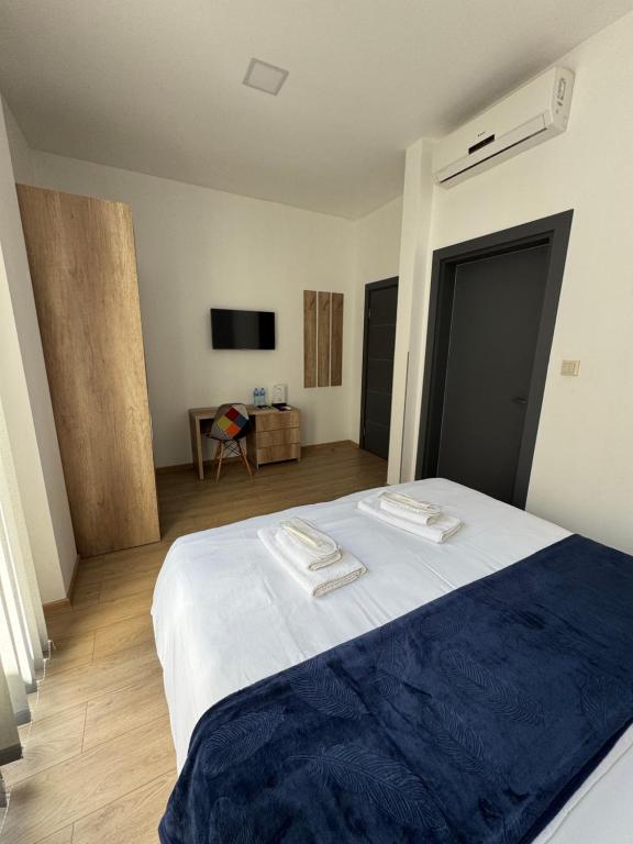 Postel nebo postele na pokoji v ubytování GH Prague Butik Hotel