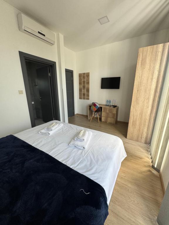 Postel nebo postele na pokoji v ubytování GH Prague Butik Hotel