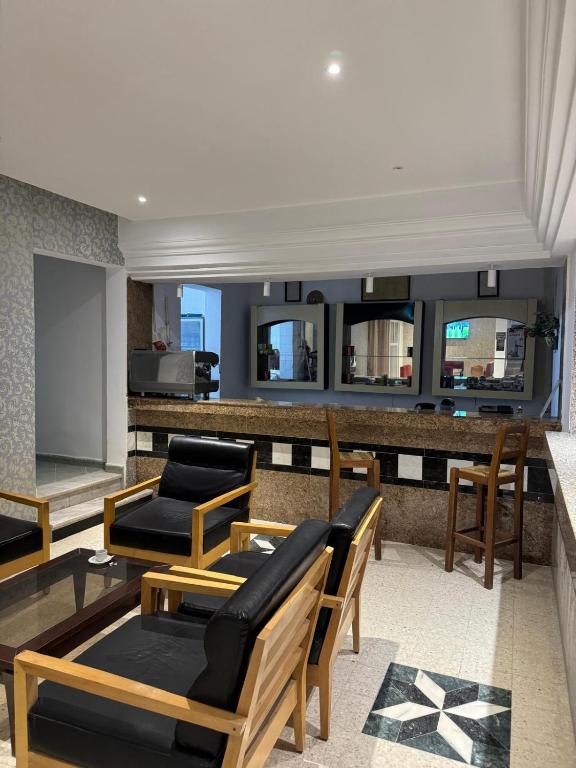 Posezení v ubytování Hôtel Ennassim