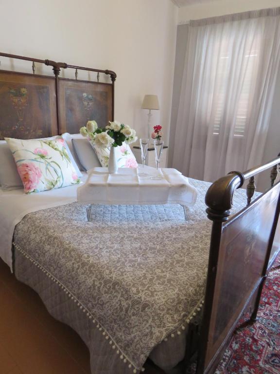 A bed or beds in a room at La Casa del Borgo Antico
