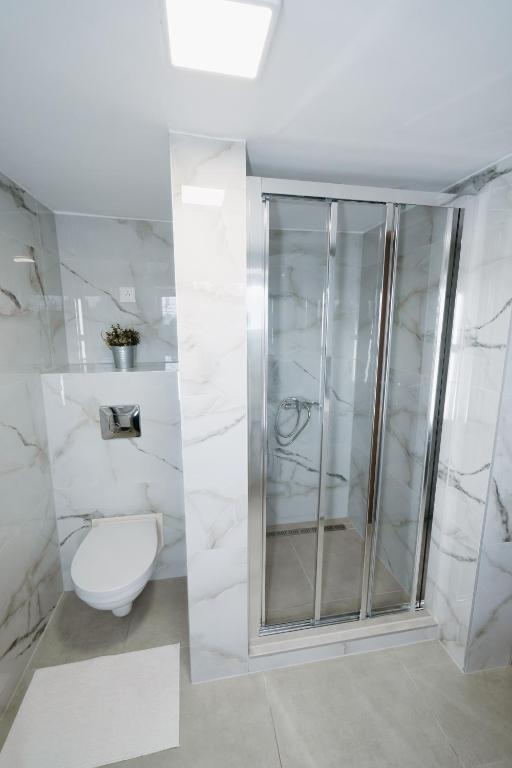 Koupelna v ubytování Chatová osada Kotva Prístav