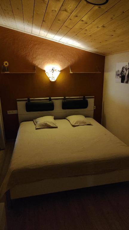 Postel nebo postele na pokoji v ubytování Vakantiewoning De Specht