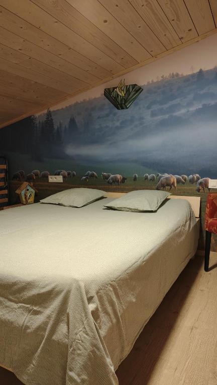 Postel nebo postele na pokoji v ubytování Vakantiewoning De Specht