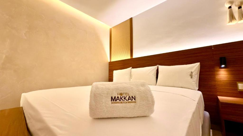 Postel nebo postele na pokoji v ubytování Hotel Makkan Boca