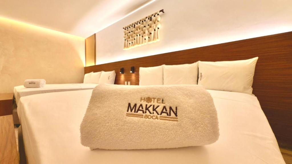 Postel nebo postele na pokoji v ubytování Hotel Makkan Boca