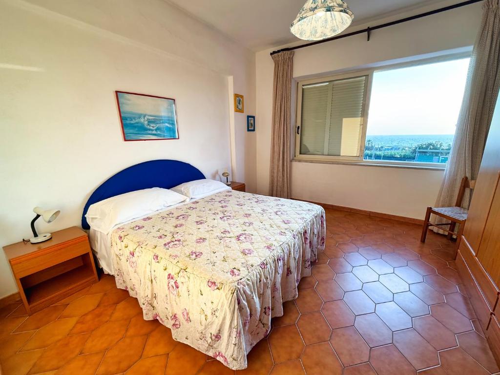 Uma cama ou camas num quarto em Hotel Villa Mena