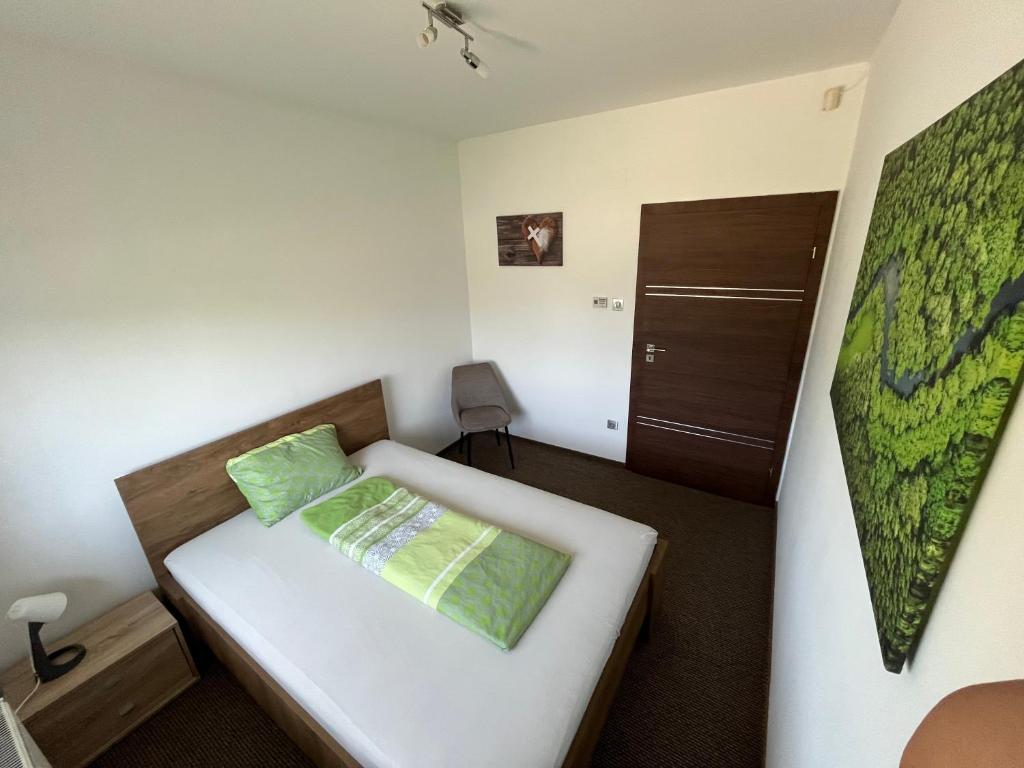 Postel nebo postele na pokoji v ubytování Exkluzív Apartman Debrecen