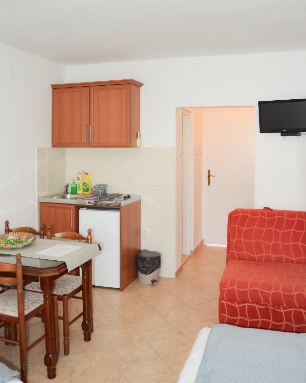 Kuchyň nebo kuchyňský kout v ubytování Zlatni Pijesak - Apartmani Čanj