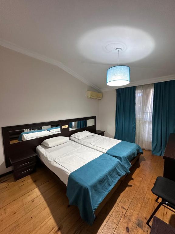 Postel nebo postele na pokoji v ubytování Hotel VISTA BATUMI