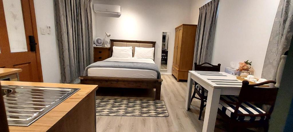 Postel nebo postele na pokoji v ubytování Studio Apartment