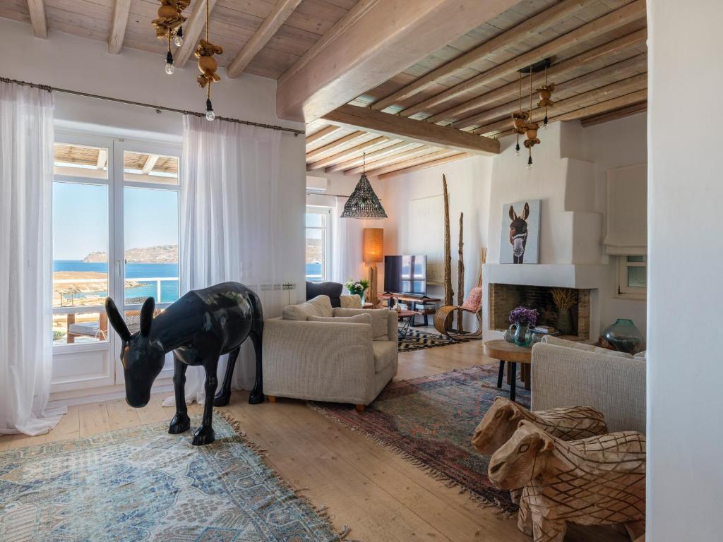 Posezení v ubytování Cosset Villa BohoChic Sea&HarbourView and Sunset by One-Villas
