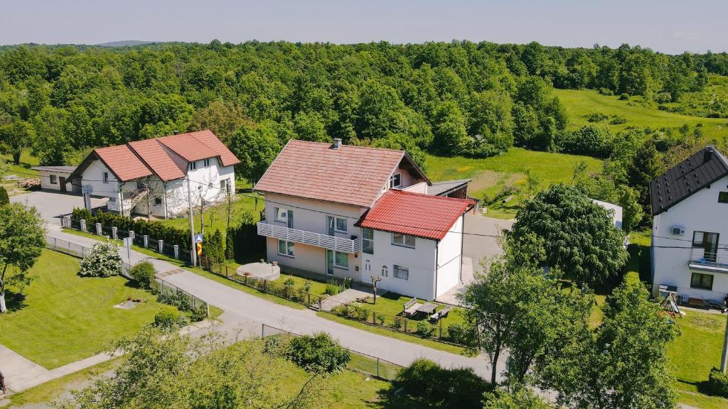 an overhead view of a house with red roof at Apartments with parking space Lipovaca, Plitvice - 17657 in Rakovica