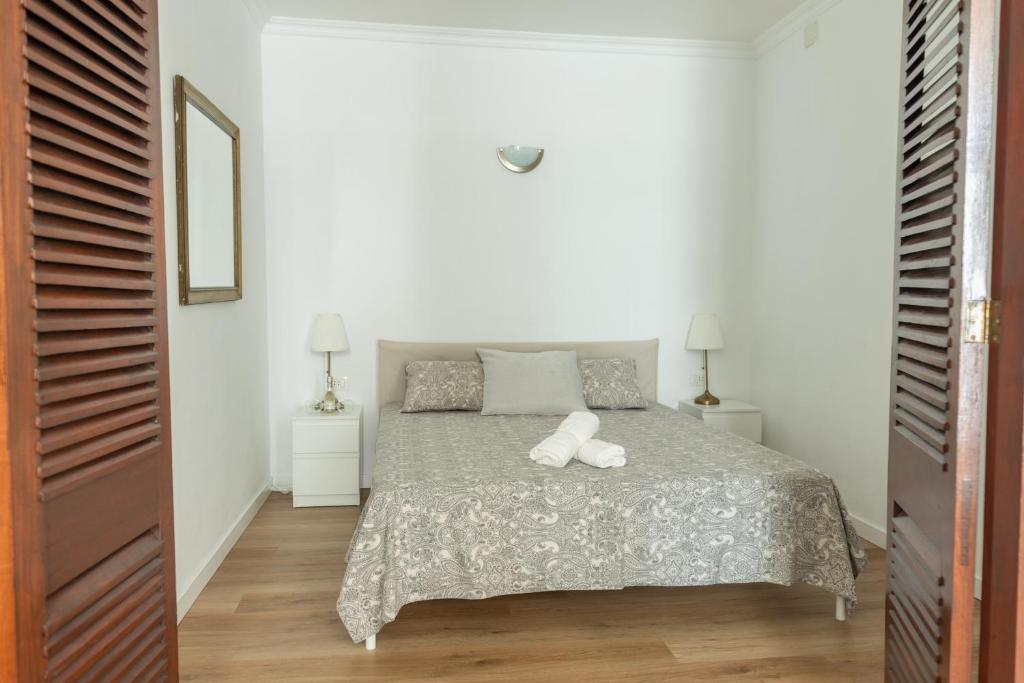 En eller flere senge i et værelse på Preciosa Reina