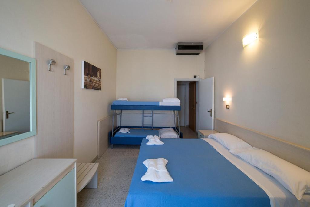 Postel nebo postele na pokoji v ubytování Hotel Europa