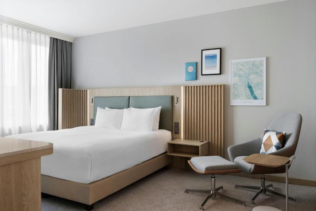 Postel nebo postele na pokoji v ubytování Courtyard by Marriott Zurich North
