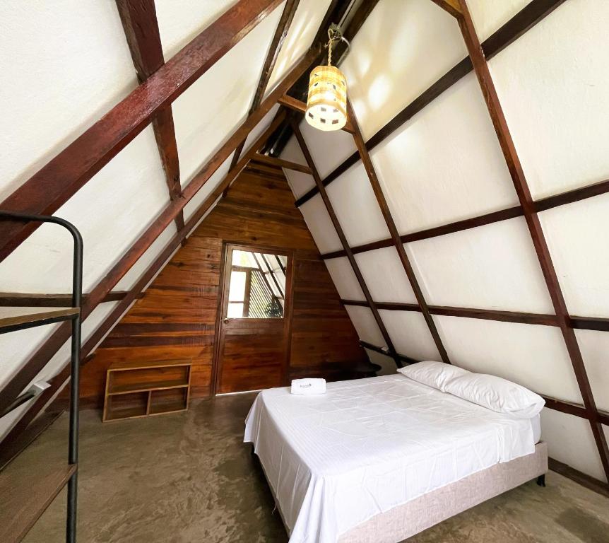 Postel nebo postele na pokoji v ubytování Glamping Jazayma Dentro del Parque Tayrona
