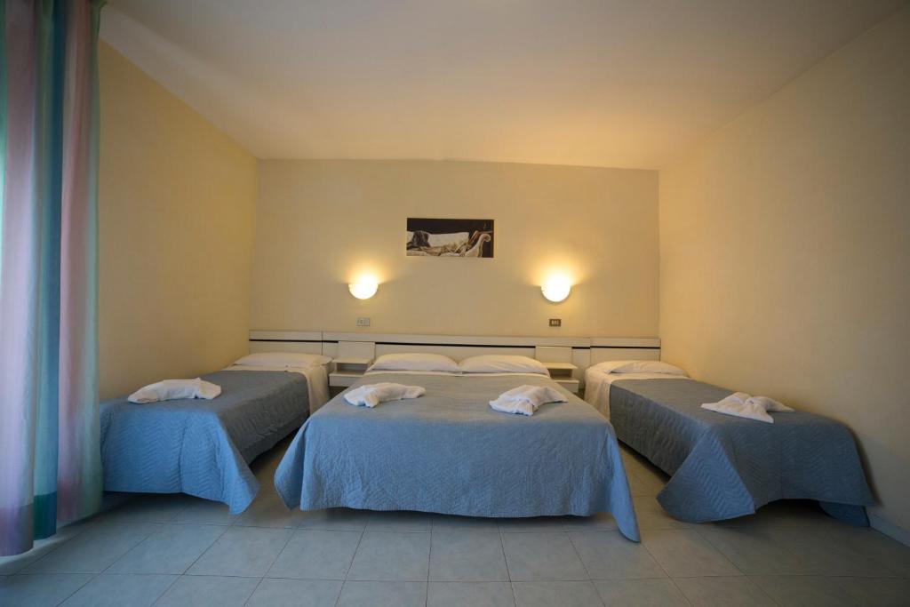 Postel nebo postele na pokoji v ubytování Hotel Europa