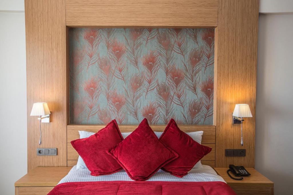 Postel nebo postele na pokoji v ubytování Hattusa Vacation Thermal Club Erzin