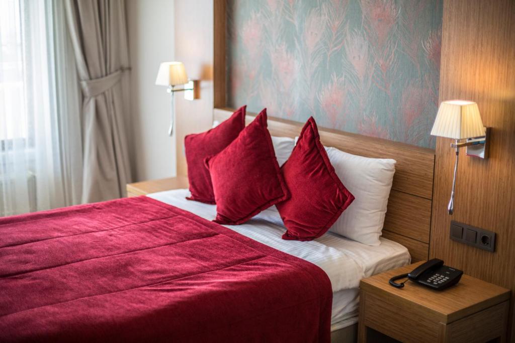 Postel nebo postele na pokoji v ubytování Hattusa Vacation Thermal Club Erzin